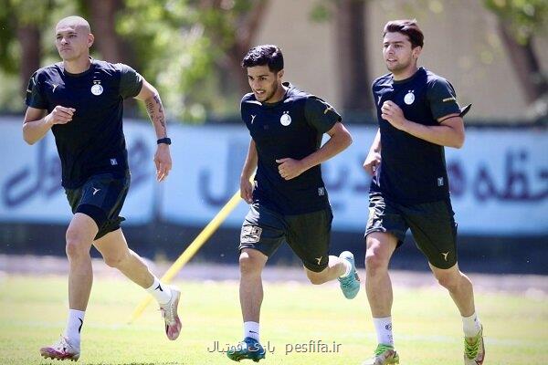 تمرین آبی پوشان زیر باران